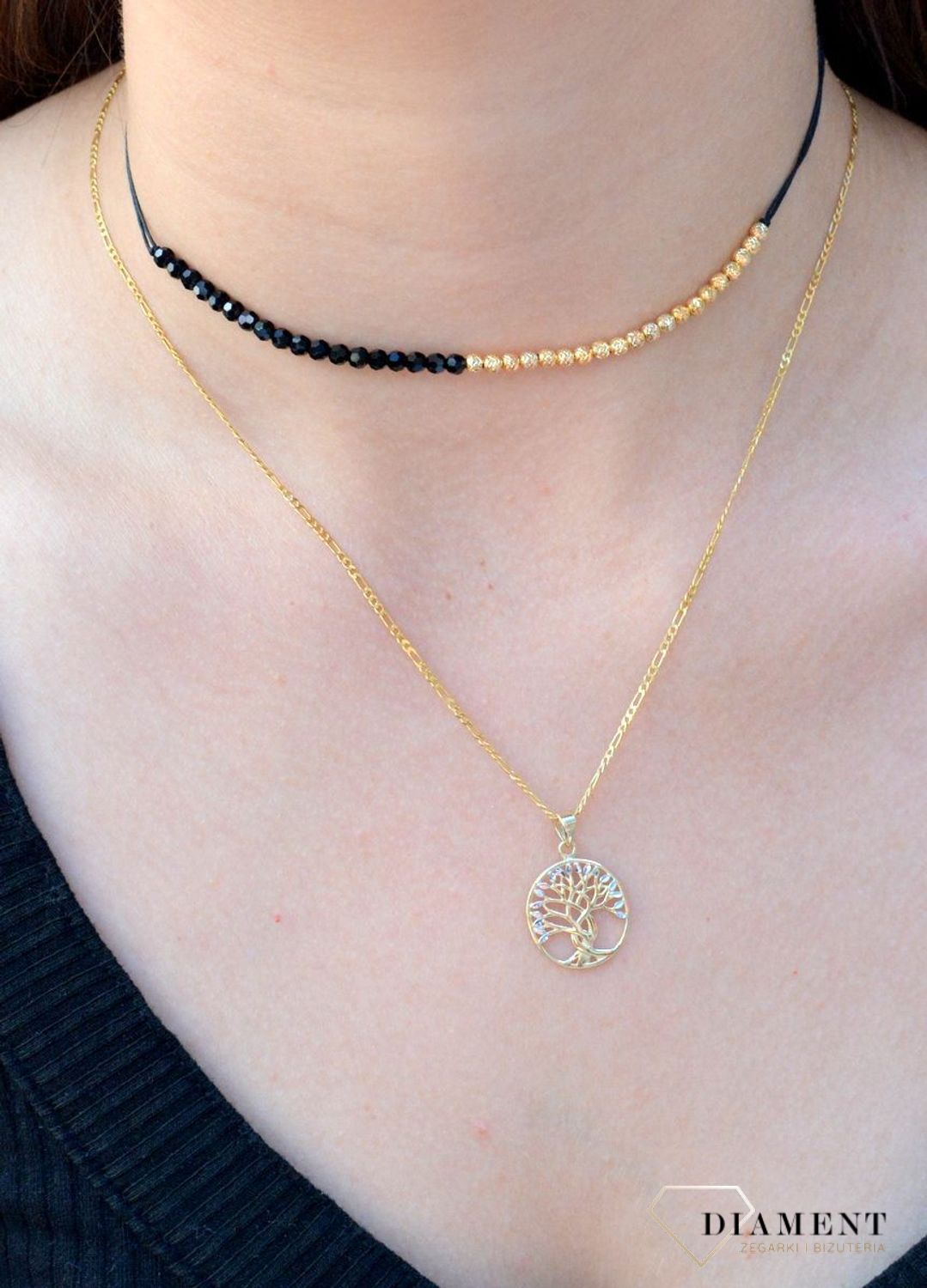 Złota zawieszka 'Drzewko szczęścia z białym złotem' ZA 4653 333. Nowoczesna zawieszka złota zawieszka drzewko szczęścia z białym złotem, w którym znajduje się kształt drzewka, które zostało ozdobione.jpg